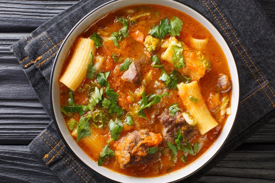 Joumou Haitian Squash Soup is served every year on the 1st of January as the Haitian nation celebrate its Independence closeup in the plate on the table.