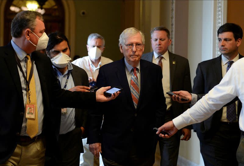 U.S. Senate Minority Leader Mitch McConnell (R-KY) is questioned by reporters at the U.S. Capitol