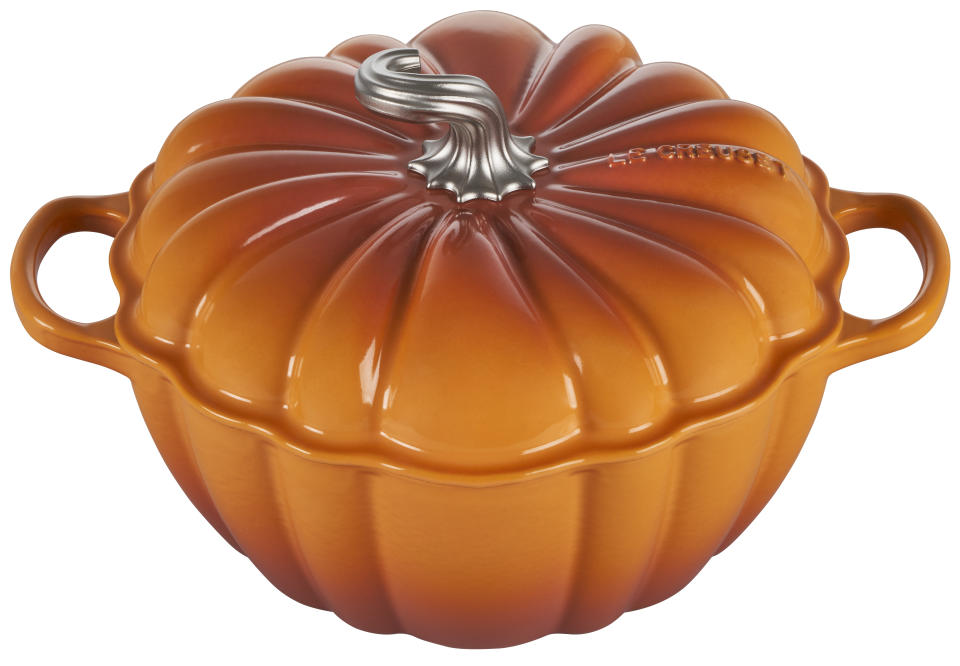 This photo shows the Pumpkin Cocotte from Le Creuset in persimmon. The homey “coastal grandmother” aesthetic makes for a range of holiday gift options. (Le Creuset via AP)