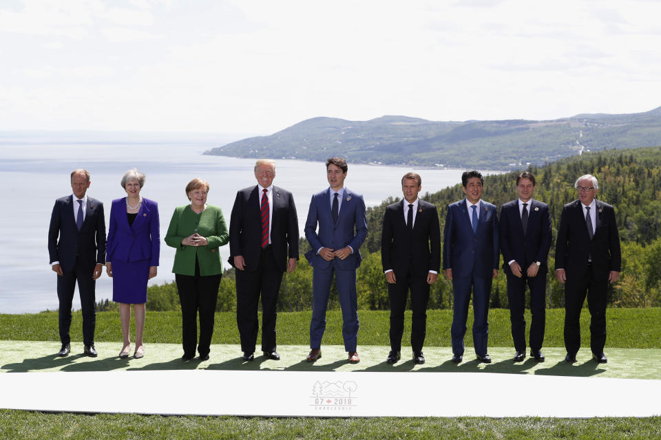 <p>L-R: European Council President Donald Tusk, British Prime Minister Theresa May, German Chancellor Angela Merkel, President Donald Trump, Canada’s Prime Minister Justin Trudeau, French President Emmanuel Macron, Japanese Prime Minister Shinzo Abe, Italian Prime Minister Giuseppe Conte and European Commission President Jean-Claude Juncker pose for a family photo at the G7 Summit in the Charlevoix city of La Malbaie, Quebec, Canada, June 8, 2018. (Photo: Yves Herman/Reuters) </p>