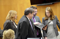 Attorneys for the state and the defense, gather before Judge David Strong, unseen, Wednesday, Feb. 19, 2020 during Day 5 of the capital murder trial of Willie Cory Godbolt at the Pike County Courthouse in Magnolia. Pictured are, from left: defense attorney Alison Steiner, assistant district attorneys Rodney Tidwell and Robert Byrd, and defense attorney Katherine Poor. Godbolt, 37, is on trial, for the May 2017 shooting deaths of eight people in Brookhaven. (Donna Campbell/The Daily Leader via AP, Pool)