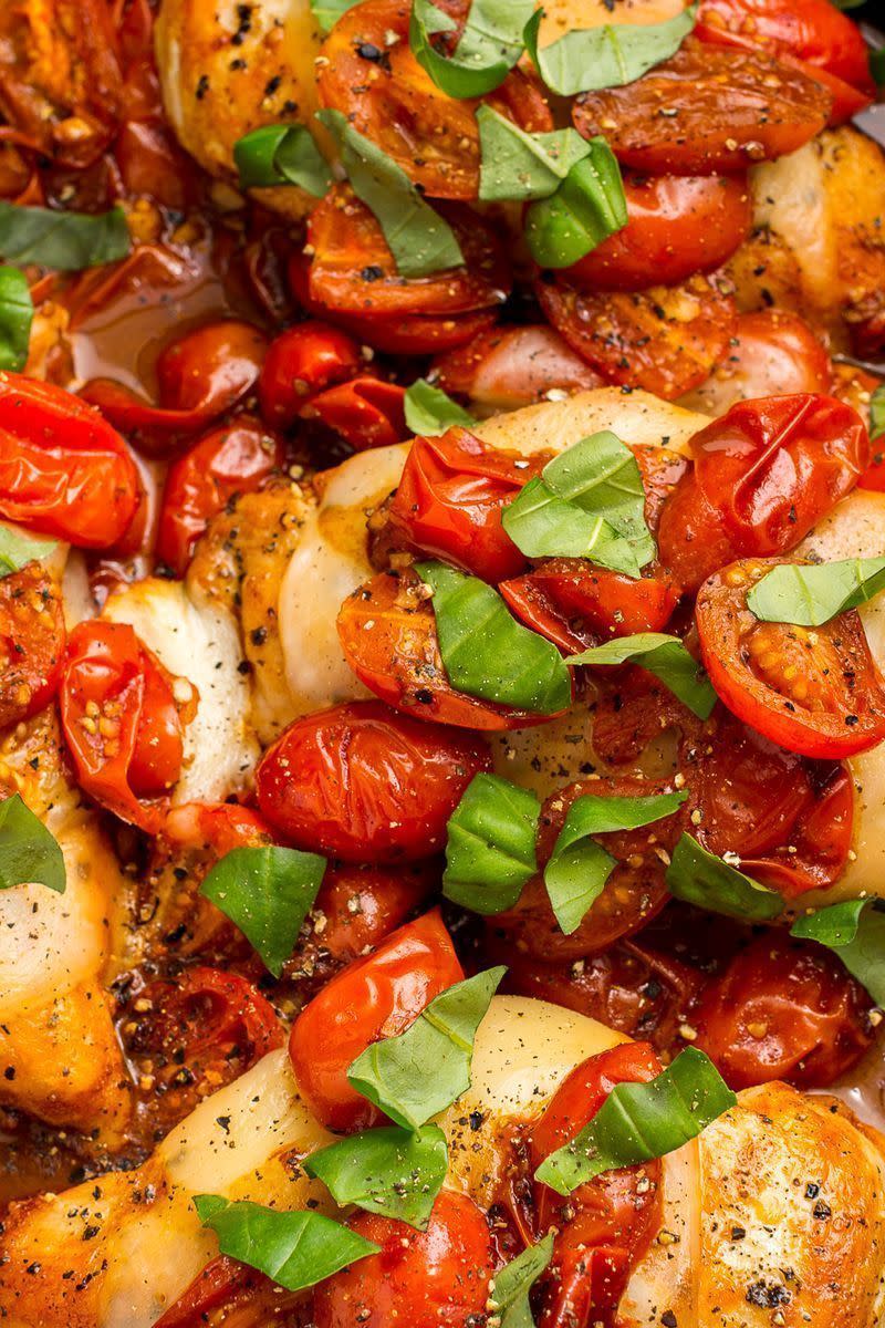 <p>Tomatoes cooked in balsamic vinegar are the perfect sweet-tart compliment to this cheesy chicken. </p><p>Get the <a href="https://www.delish.com/uk/cooking/recipes/a29018750/caprese-chicken-recipe/" rel="nofollow noopener" target="_blank" data-ylk="slk:Caprese Chicken;elm:context_link;itc:0;sec:content-canvas" class="link ">Caprese Chicken</a> recipe.</p>