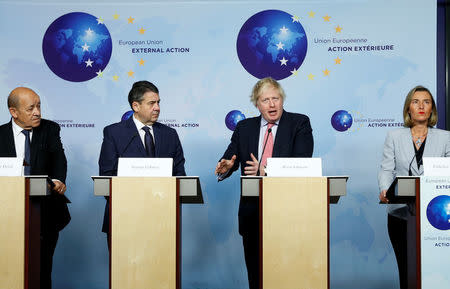 Britain's Foreign Secretary Boris Johnson attends a news conference with French Foreign Minister Jean-Yves Le Drian, German counterpart Sigmar Gabriel and European Union's foreign policy chief Federica Mogherini after meeting Iran's Foreign Minister Mohammad Javad Zarif (unseen) in Brussels, Belgium January 11, 2018. REUTERS/Francois Lenoir