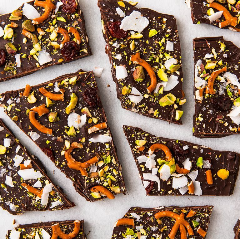 <p>This chocolate bark is the PERFECT 3 P.M. snack. Loaded with dried cherries, pretzels, pistachios, and coconut flakes, it's just as healthy as it is satisfying.</p><p>Get the <a href="https://www.delish.com/uk/cooking/recipes/a29954883/chocolate-bark-recipe/" rel="nofollow noopener" target="_blank" data-ylk="slk:Sweet 'N Salty Chocolate Bark;elm:context_link;itc:0;sec:content-canvas" class="link ">Sweet 'N Salty Chocolate Bark</a> recipe.</p>