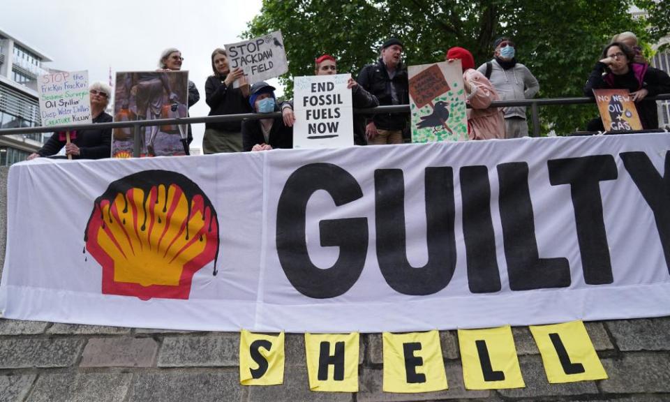 Demonstrators protest outside the Shell AGM at Central Hall in Westminster