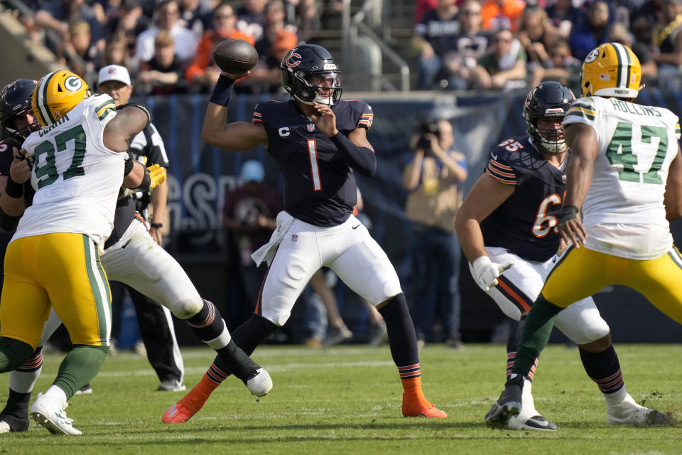 Chicago Bears quarterback Justin Fields passes during the first half of an NFL football game against the Green Bay Packers Sunday, Sept. 10, 2023, in Chicago. (AP Photo/Nam Y. Huh)