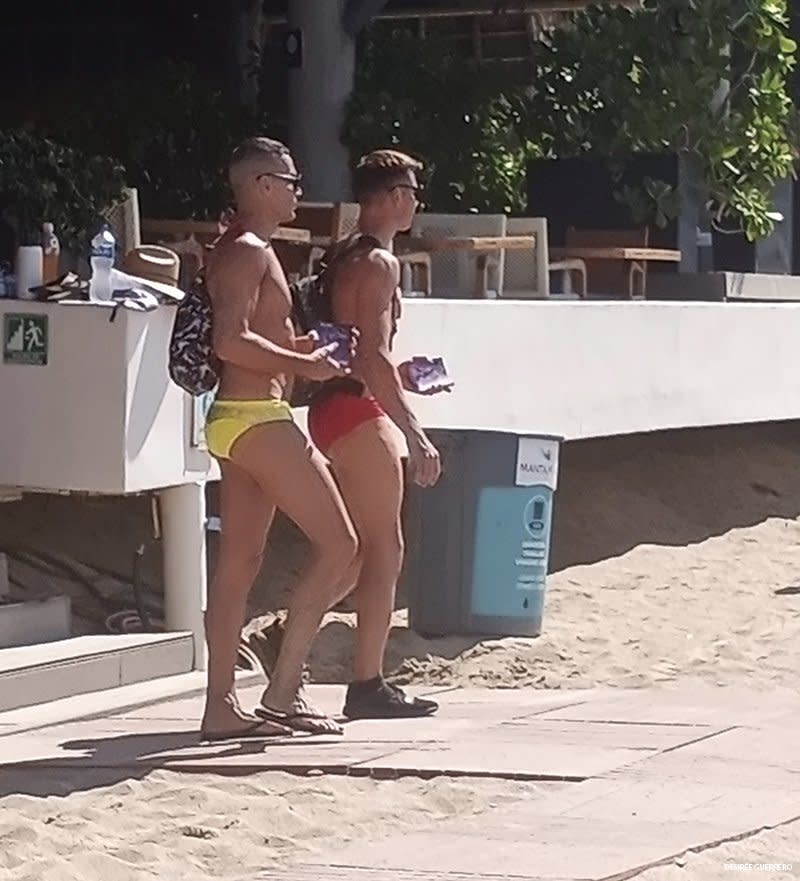 Speedo-clad boys on the beach in Zona Romantica