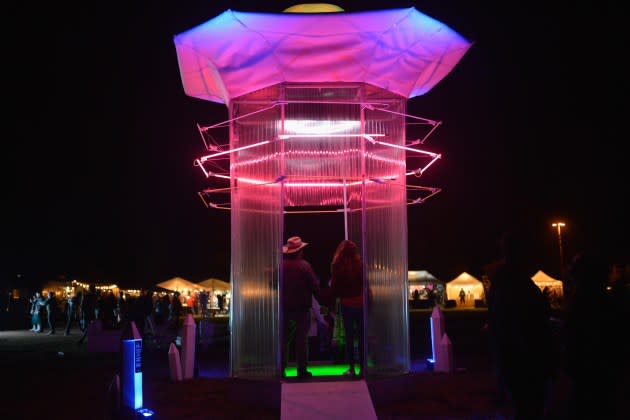 Fans enjoying an art installation at the 2018 Desert Daze Festival in Lake Perris, California. - Credit: Chelsea Guglielmino/Getty Images