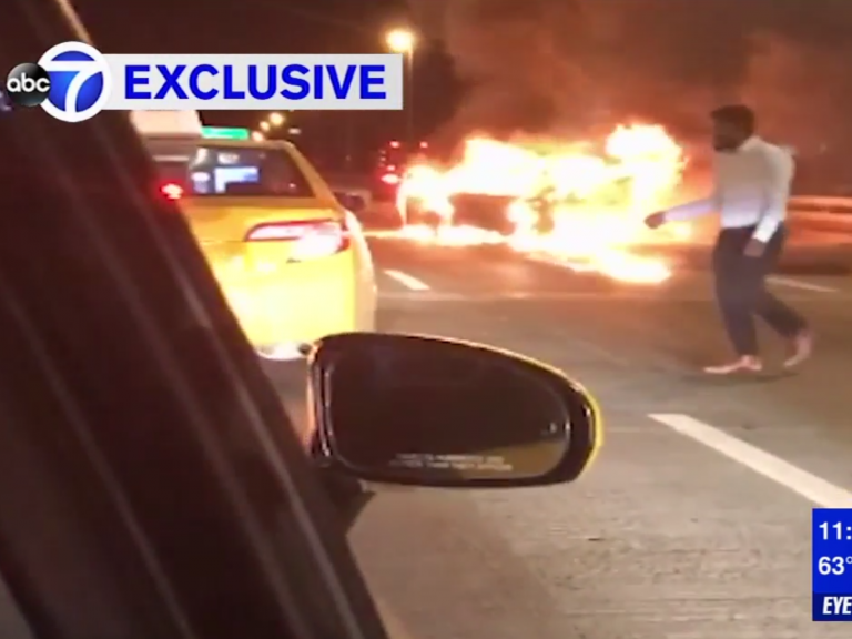 New York man hails cab after 'abandoning woman trapped in his burning car'