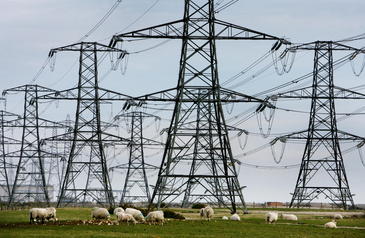 File photo dated 26/3/2008 overhead power cables from the Dungeness Nuclear Power Station stretching across the Kent countryside. Issue date: Wednesday October 27, 2021.