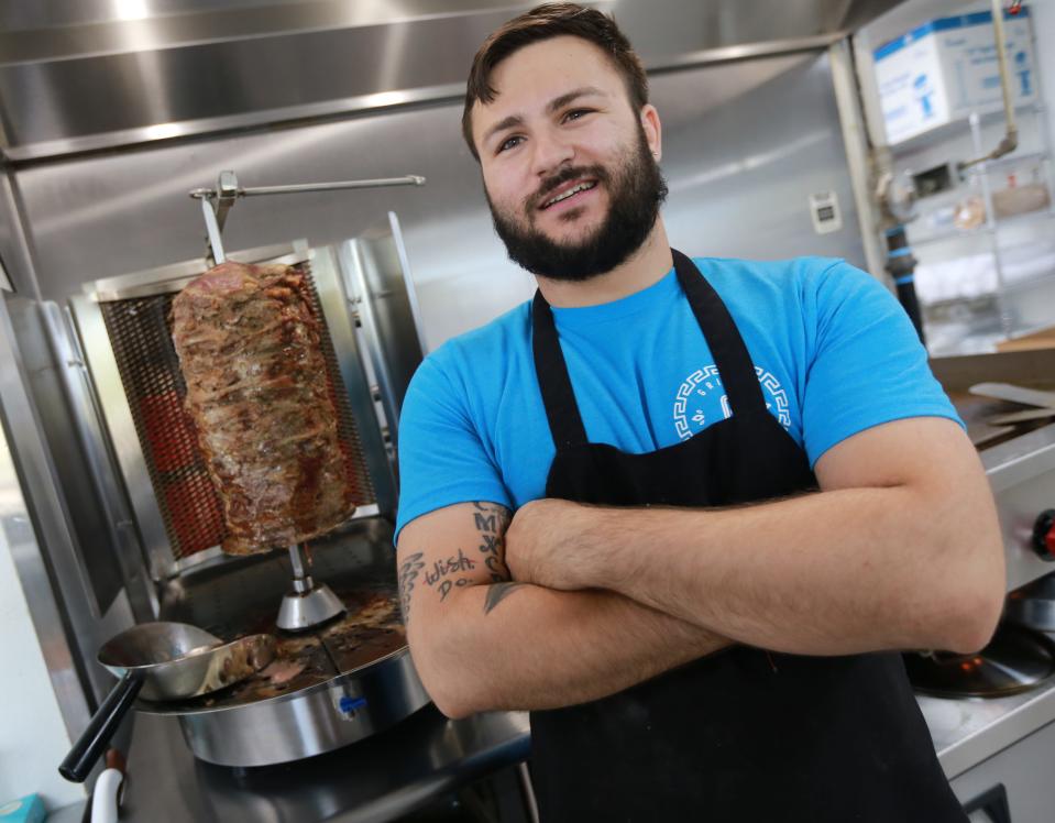 Owner and manager George Tambasidis in the kitchen at Grilla Greek Kouzina on Broadway in Taunton on Friday, June 10, 2022. 