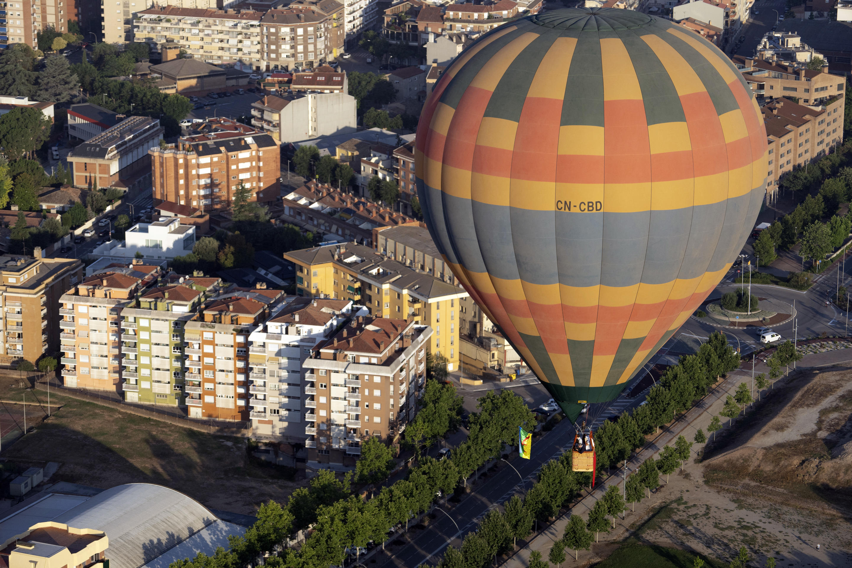 Hot-air balloons fly over the Catalan town of Igualada, Spain, during the balloon festival on July 11. 