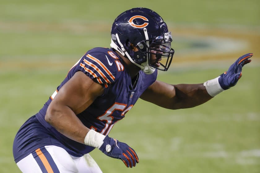 Chicago Bears outside linebacker Khalil Mack (52) defends against the Tampa Bay Buccaneers during the second half of an NFL football game, Thursday, Oct. 8, 2020, in Chicago. (AP Photo/Kamil Krzaczynski)