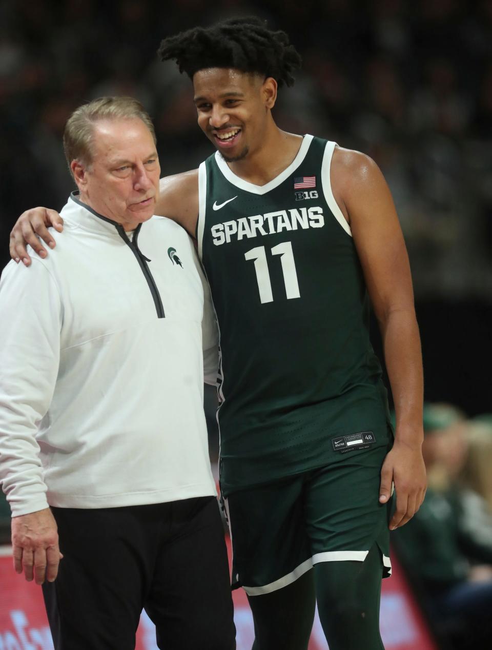 Michigan State guard A.J. Hoggard and coach Tom Izzo on the bench during MSU's 88-64 win over Baylor on Saturday, Dec.16, 2023, at Little Caesars Arena.
