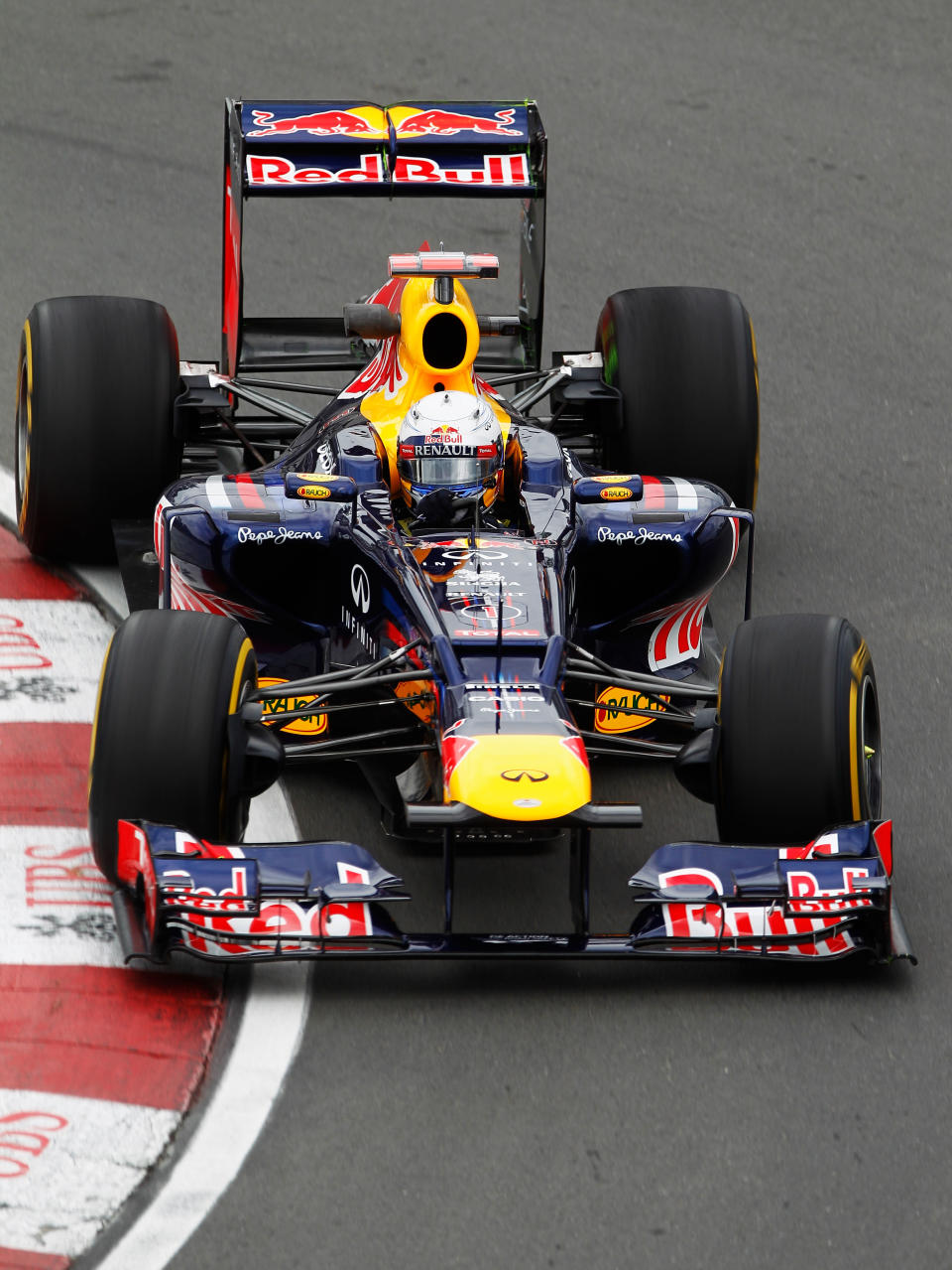 MONTREAL, CANADA - JUNE 08: Sebastian Vettel of Germany and Red Bull Racing drives during practice for the Canadian Formula One Grand Prix at the Circuit Gilles Villeneuve on June 8, 2012 in Montreal, Canada. (Photo by Paul Gilham/Getty Images)