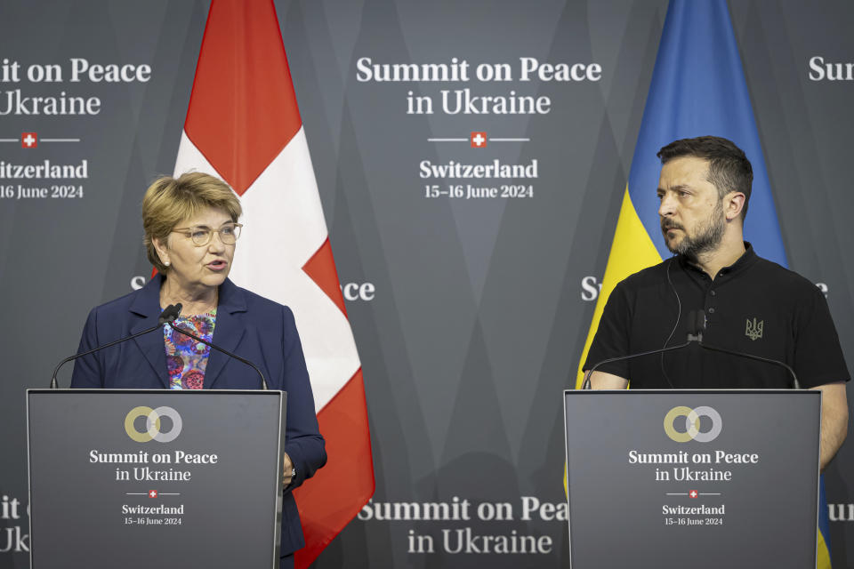 Swiss Federal President Viola Amherd, left, and Ukrainian President Volodymyr Zelenskyy attend the closing news conference during the Summit on peace in Ukraine, in Obbürgen, Switzerland, Sunday, June 16, 2024. (Urs Flueeler/Keystone via AP)