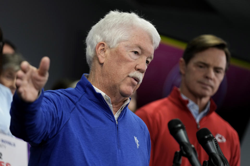 Kansas City Royals owner John Sherman, left, address the media while Kansas City Chiefs president Mark Donovan looks on during a news conference about a plan to extend a sales tax to provide funding to build a new stadium for the Royals and stadium improvement for the Chiefs Saturday, March 30, 2024, at Kauffman Stadium in Kansas City, Mo. Jackson County, Mo. residents will vote on the question Tuesday, April 2. (AP Photo/Charlie Riedel)