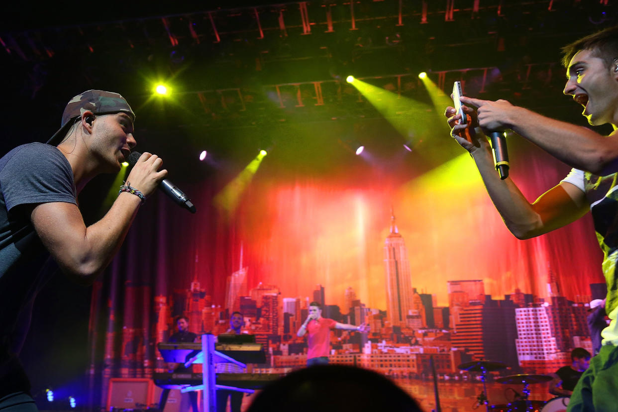 ATLANTIC CITY, NJ - AUGUST 23:  (L-R) Max George and Tom Parker of The Wanted perform at The Borgata Hotel Casino & Spa August 23, 2013 in Atlantic City, New Jersey.  (Photo by Bill McCay/WireImage)