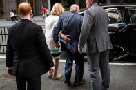<p>Fox News chairman Roger Ailes is helped to his car by his wife, Elizabeth, as they leave the News Corp. building, July 19, 2016, in New York. (Photo: Drew Angerer/Getty Images) </p>