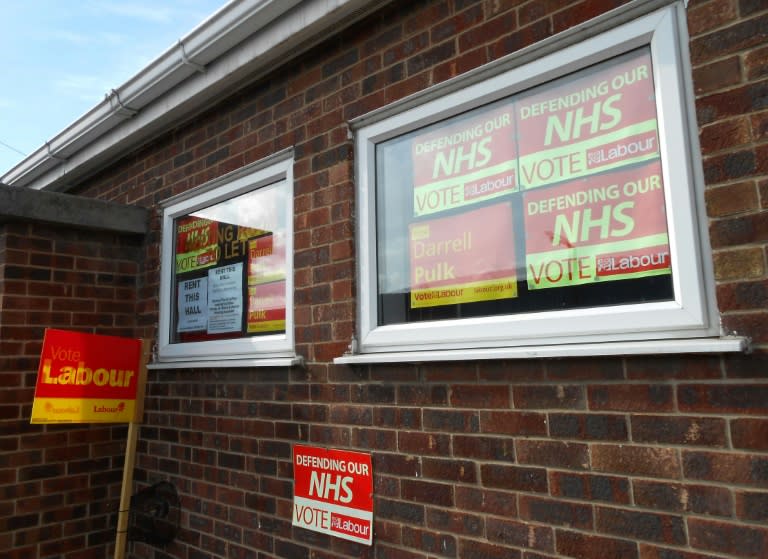 Opposition Labour party posters pictured on the windows of the Labour hall in Retford, Nottinghamshire on April 23, 2017