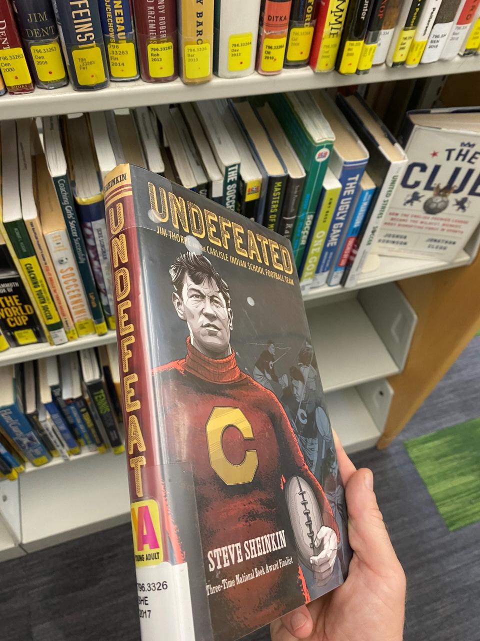 The Hamilton East Public Library Board moved several Young Adult books to the sports section, making them more difficult to find.