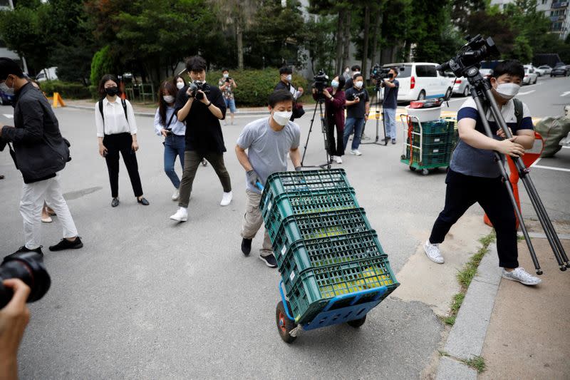 North Korean defector group prepares plastic bottles filled with rice and masks to be sent towards North Korea