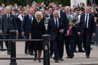 <p>LONDON, ENGLAND - SEPTEMBER 09: King Charles III and Camilla, Queen Consort, greet well-wishers outside Buckingham Palace following the death of Queen Elizabeth II, on September 9, 2022 in London, United Kingdom. Elizabeth Alexandra Mary Windsor was born in Bruton Street, Mayfair, London on 21 April 1926. She married Prince Philip in 1947 and acceded the throne of the United Kingdom and Commonwealth on 6 February 1952 after the death of her Father, King George VI. Queen Elizabeth II died at Balmoral Castle in Scotland on September 8, 2022, and is succeeded by her eldest son, King Charles III.(Photo by Carl Court/Getty Images)</p> 