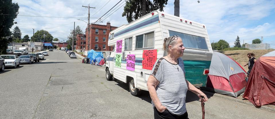 Mama Sharon, the oldest woman living in the MLK Way encampment, talks about the needs of those living on the street on Wednesday, July 12, 2023. Mama Sharon resides in the RV behind her.