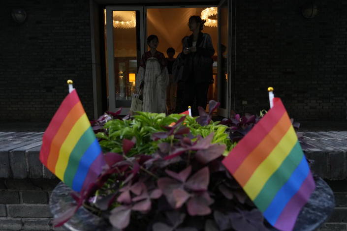 Attendees arrive for the opening ceremony for Diversity Week held at the Swedish embassy in Beijing, Friday, May 12, 2023. On Monday, May 15, 2023, the advocacy group the Beijing LGBT Center became the latest organization to close under a crackdown by Chinese leader Xi Jinping's government. (AP Photo/Ng Han Guan)