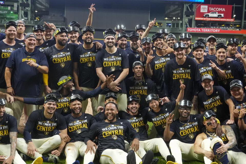 The Milwaukee Brewers celebrate after a baseball game against the Philadelphia Phillies Wednesday, Sept. 18, 2024, in Milwaukee. The Brewers won 2-1 and clinched the National League Central division. (AP Photo/Morry Gash)