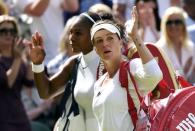 Britain Tennis - Wimbledon - All England Lawn Tennis & Croquet Club, Wimbledon, England - 5/7/16 USA's Serena Williams and Russia's Anastasia Pavlyuchenkova wave to the crowd as they walk off court after their match REUTERS/Toby Melville