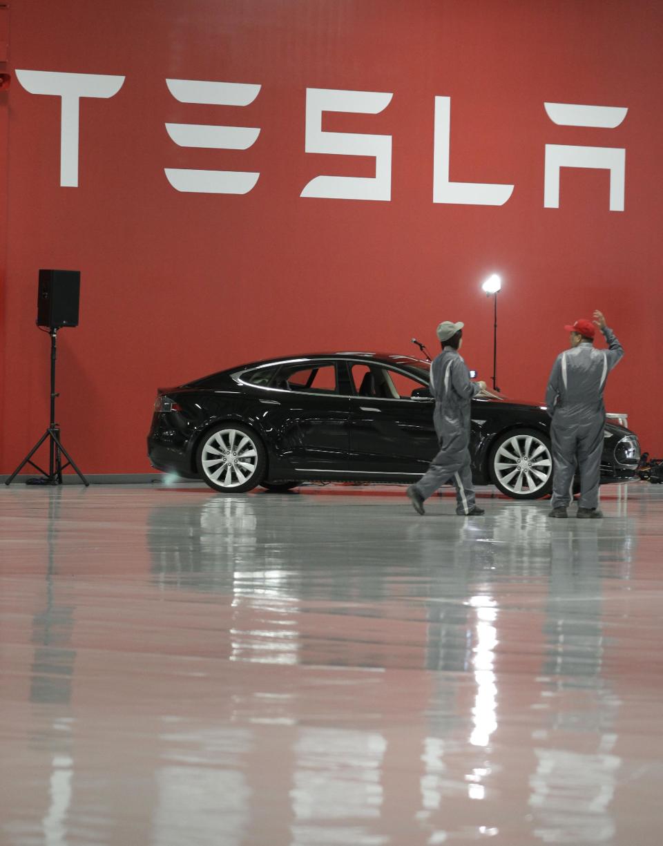 A Tesla Model S on display at the Tesla factory in Fremont, Calif., Friday, June 22, 2012. The first Model S sedan car will be rolling off the assembly line on Friday. (AP Photo/Paul Sakuma)