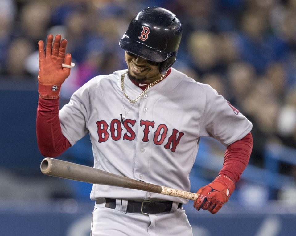 Boston Red Sox's Mookie Betts reacts after popping out in the third inning against the Toronto Blue Jays in a baseball game Thursday, Sept. 12, 2019, in Toronto. (Fred Thornhill/The Canadian Press via AP)