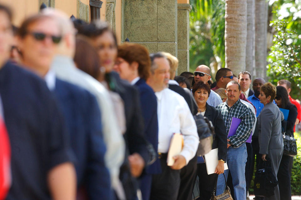 Feb 26, 2009 - Ft. Lauderdale, Florida, USA - Thousands of people waited in line to attend a Job Fair that drew thousands at the Signature Grand in Ft Lauderdale, FL. New US jobless claims surged to 667,000 in the past week, the highest in over 26 years, data showed Thursday in a sign of ongoing labor market stress. The Labor Department said the number of initial claims for unemplo