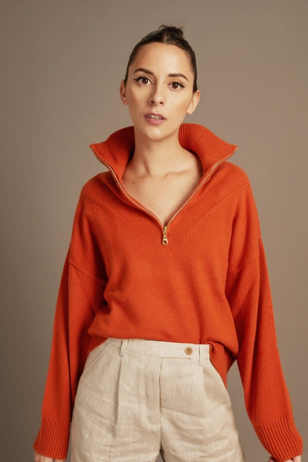 <a href="https://cadrestyle.com/products/the-peggy-half-zip-sweater" rel="nofollow noopener" target="_blank" data-ylk="slk:Public Habit's Peggy Half-Zip Sweater,;elm:context_link;itc:0;sec:content-canvas" class="link ">Public Habit's Peggy Half-Zip Sweater,</a> sold on Cadre.<p>Photo: Courtesy of Cadre</p>