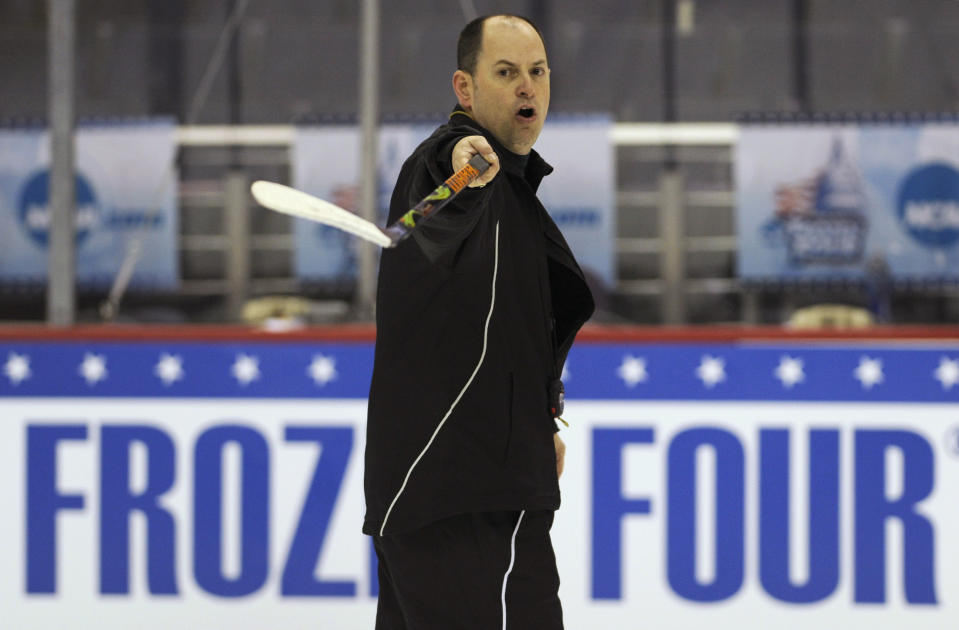 FILE - Bemidji State head coach Tom Serratore leads his players during NCAA Frozen Four college hockey practice at the Verizon Center in Washington, in this Wednesday, April 8, 2009, file photo. The NCAA men's hockey tournament bracket this year would have made Herb Brooks proud. For the first time, all five Division I programs from Minnesota made the 16-team field. (AP Photo/Susan Walsh, File)