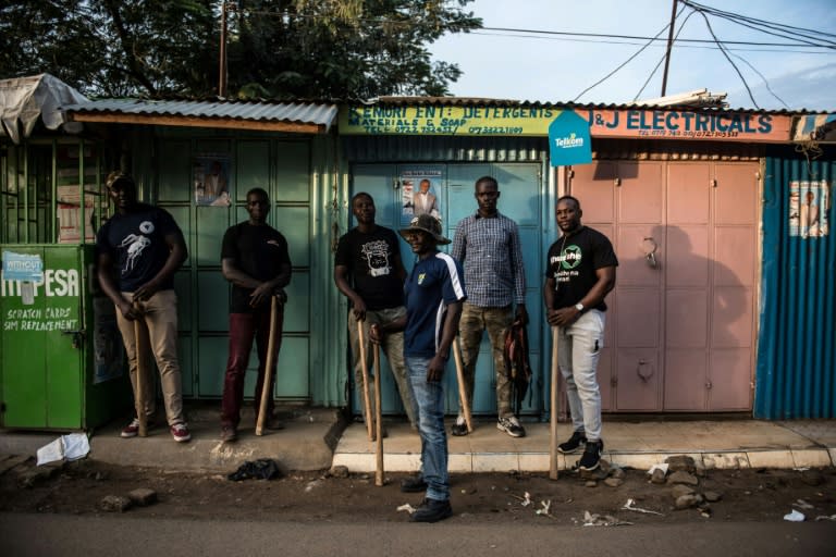 Vigilante groups have formed in some places to protect shops from looting during election-related violence