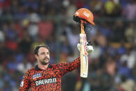 Sunrisers Hyderabad's Travis Head celebrates scoring a century during the Indian Premier League cricket match between Royal Challengers Bangaluru and Sunrisers Hyderabad in Bengaluru, India, Monday, April 15, 2024. (AP Photo/Kashif Masood)