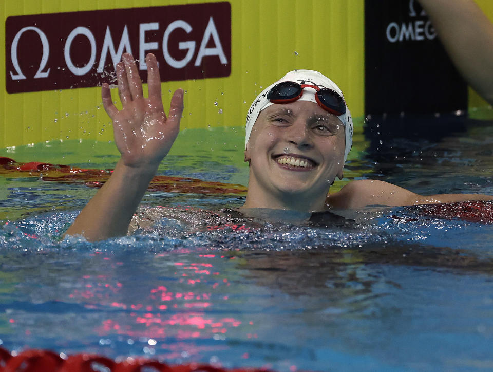 Katie Ledecky (pictured) smiles after a race.