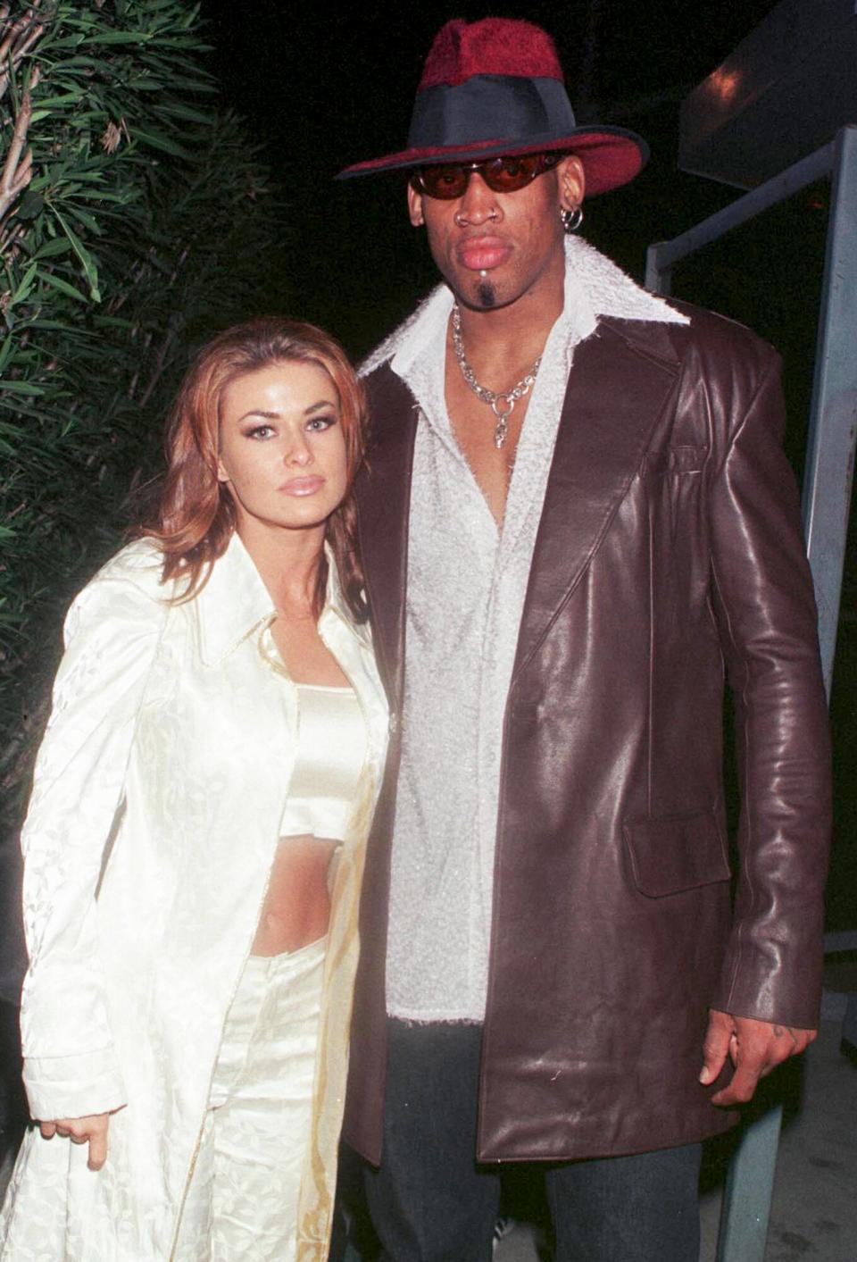 Dennis Rodman celebrates his first winning game out on the town at GOODBAR with wife Carmen Electra.