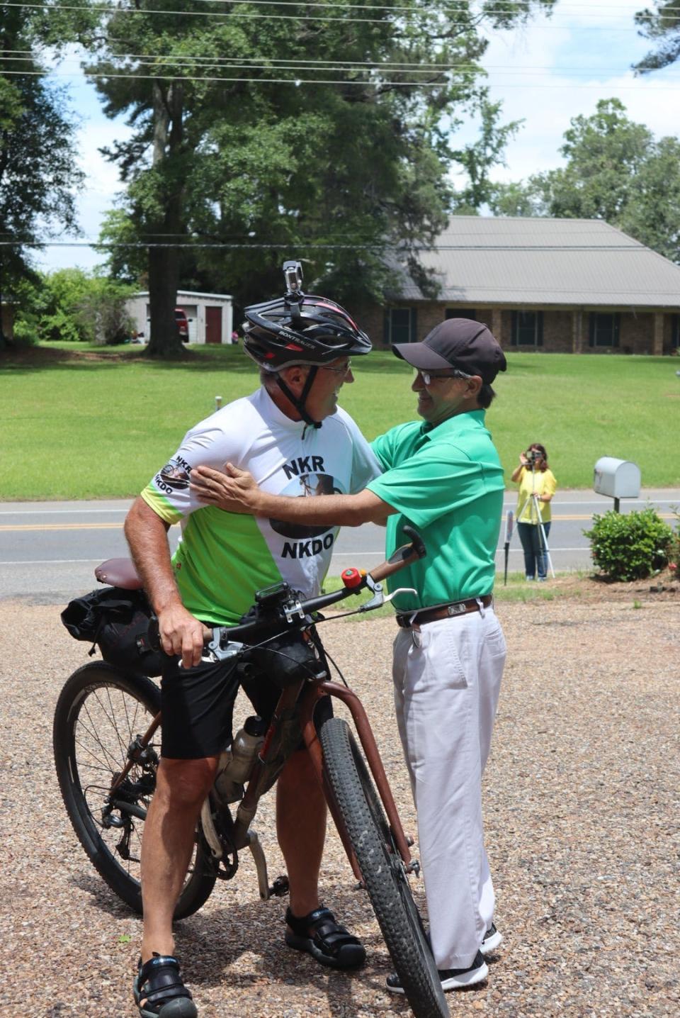 Mark Scotch, left, greets Hugh Smith during his 1,600-mile bike ride he's calling the "The Organ Trail." Scotch met Smith in Natchitoches, Louisiana and learned he needed a kidney for a transplant.