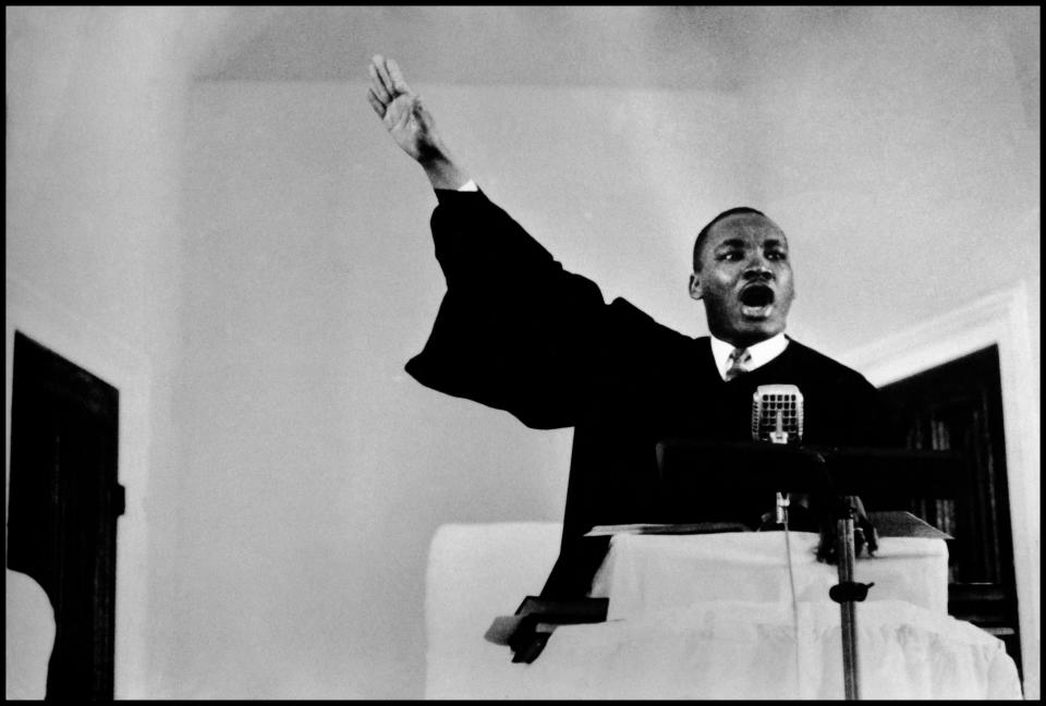 Photographer Bob Henriques’s 1960 image of Dr. Martin Luther King Jr. at the podium delivering a speech goes along with a quote from the inspiring leader. “Every man lives in two realms, the internal and the external. The internal is that realm of spiritual ends expressed in art, literature, morals, and religion. The external is that complex of devices, techniques, mechanisms, and instrumentalities by means of which we live.”