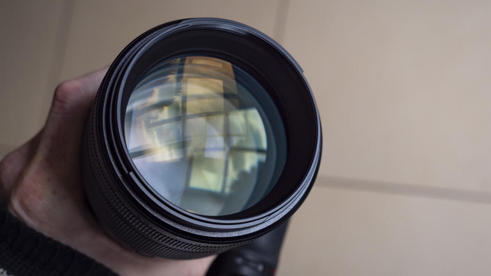Close up of the Nikon Z 135mm f/1.8 S Plena lens aperture blades fully open
