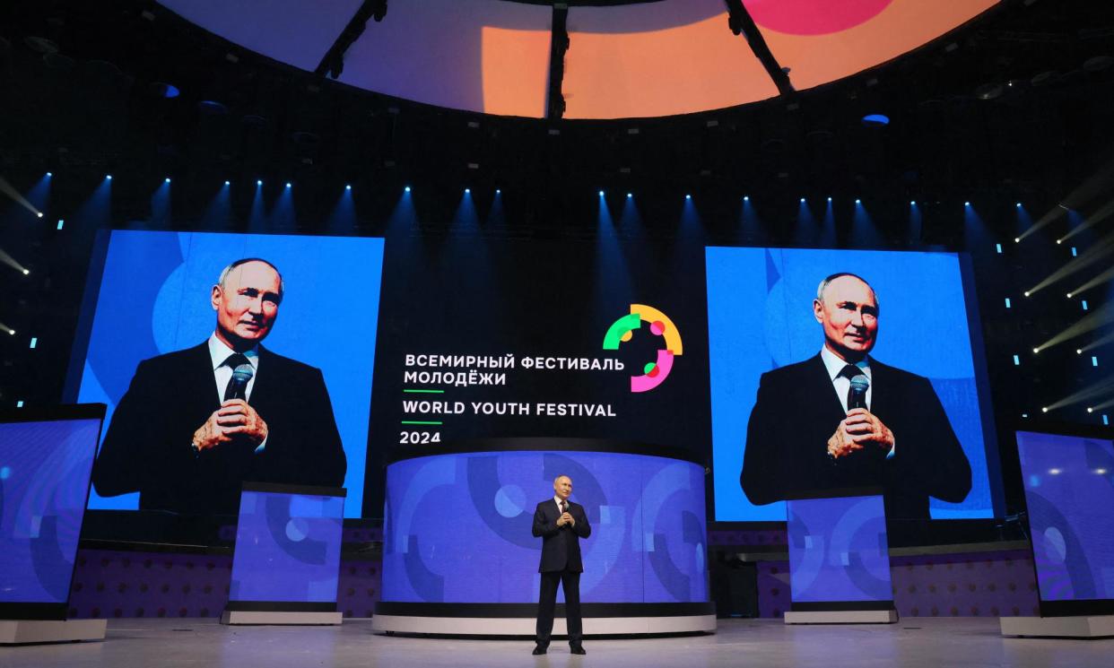 <span>Vladimir Putin delivers a speech at the closing ceremony of the 2024 World Youth Festival in Sochi earlier this week.</span><span>Photograph: Mikhail Metzel/AFP/Getty Images</span>