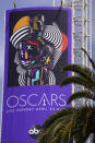 A sign advertising this year's Oscars ceremony is pictured near the Dolby Theatre, Thursday, April 15, 2021, in Los Angeles. The Dolby Theatre is one of the locations being used for the 93rd Academy Awards on Sunday, April 25. (AP Photo/Chris Pizzello)