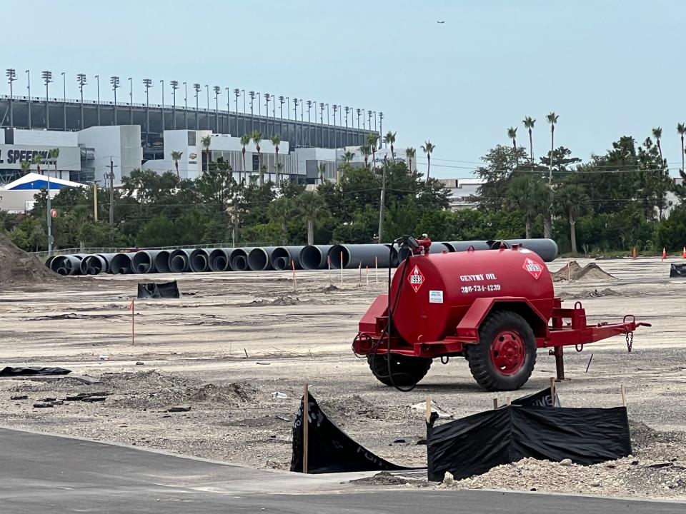 Land is being cleared for the future Costco store at One Daytona, as Daytona International Speedway looms in the distance, on Monday, July 31, 2023.