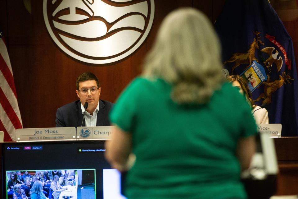 Commissioner and Chairperson Joe Moss sits during a public comment made by Health Director Adeline Hambley Tuesday, Sept. 26, 2023, at the Ottawa County Offices in West Olive.