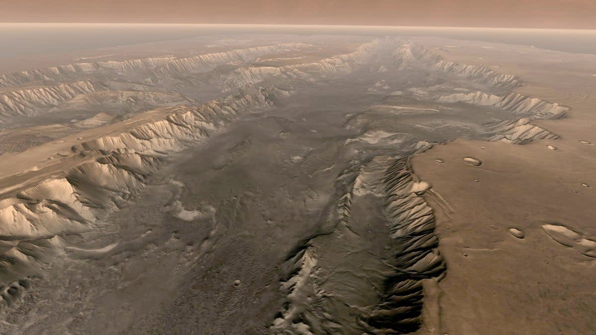 Mars’ own Grand Canyon, Valles Marineris, is shown on the surface of the planet in this composite image made aboard NASA’s Mars Odyssey spacecraft (Getty Images)