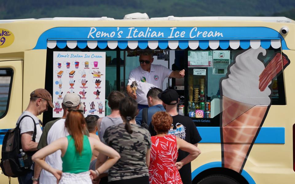 People queuing for the ice cream van - Andrew Milligan