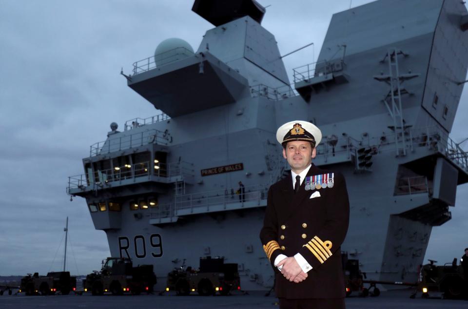Commanding officer Captain Darren Houston on the aircraft carrier (PA)